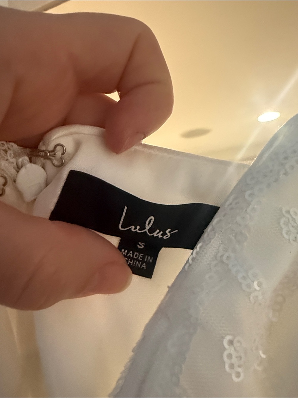 Lulu’s wide leg, sequin white jumpsuit! - Picture 2 of 6